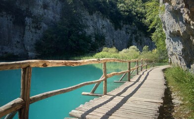 wooden bridge over the lake with a barrier