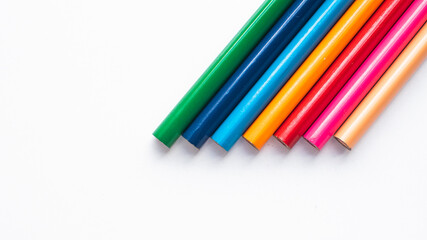 the reverse side of colored pencils. back to school concept. isolate on a white background