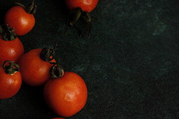 Red tomatoes from garden for vegetable food with copy space.