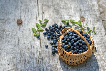 Top view of wild blueberry's on wooden table. Blueberries are an antioxidant super food.