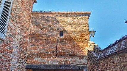 Ancient building with bricks in Città della Pieve, Italy.