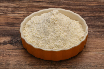 Wheat flour heap in the bowl