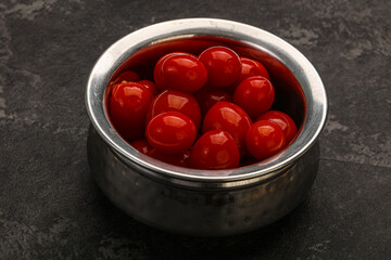 Pickled cherry tomatoes in the bowl