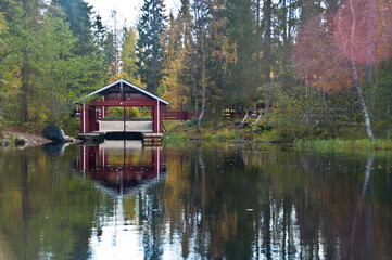 Fototapeta premium Boat house in a small canyon in a national park in East-Finland