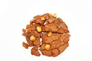 Broken oatmeal chip cookies with walnut. Cookies broken in pieces with crumbs