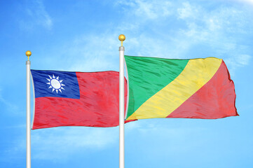 Taiwan and Congo two flags on flagpoles and blue sky