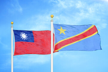 Taiwan and Congo Democratic Republic two flags on flagpoles and blue sky