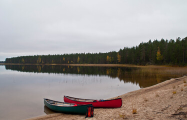 Canoes at a lake in the region of North-Karelia, Finland