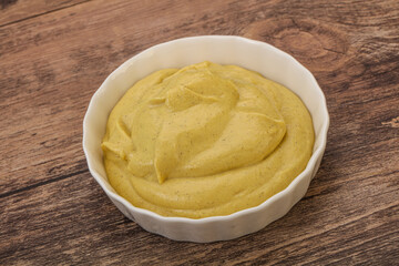 Dijon mustard sauce in the bowl