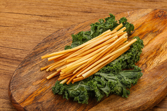 Chechel cheese sticks over board