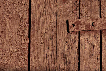 old weathered wood plank painted brown as background