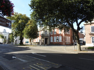 A view of the buildings and street in the city