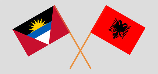 Crossed flags of Albania and Antigua and Barbuda