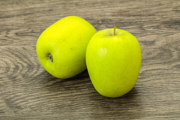 Two ripe green sweet apples