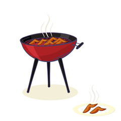 Round barbecue grill with cooking chicken wings