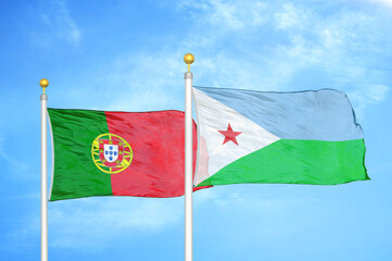 Portugal and Djibouti two flags on flagpoles and blue sky