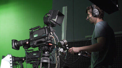 Film Crew in Green Studio
