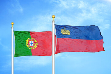 Portugal and Liechtenstein two flags on flagpoles and blue sky
