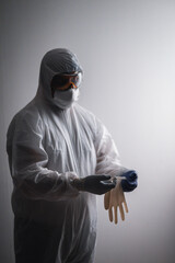doctor and his protective equipment to fight covid19  - 368535527