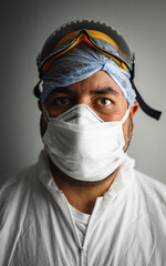 doctor and his protective equipment to fight covid19  - 368535597
