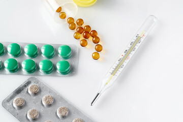 thermometer, pills and vitamin. Pharmacy