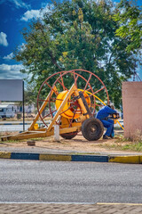Worker with cables
