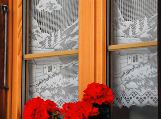 Switzerland- Lace Curtains and Geraniums