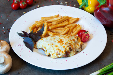 Delicious food on a grey table