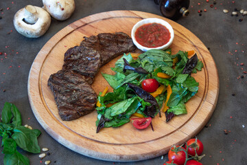 Delicious food on a grey table