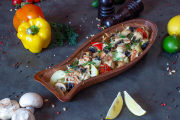 Delicious food on a grey table
