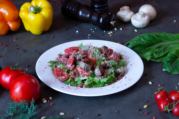 Delicious food on a grey table
