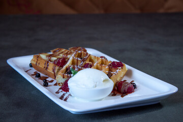 Delicious food on a grey table