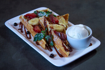 Delicious food on a grey table