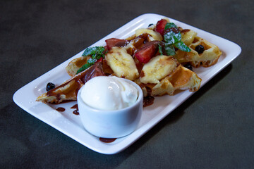 Delicious food on a grey table