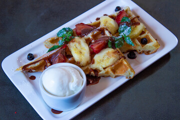 Delicious food on a grey table