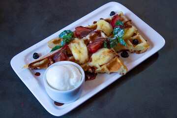 Delicious food on a grey table