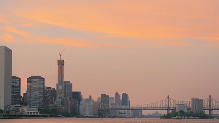 landscape of manhattan and queensboro bridge  sunset time 