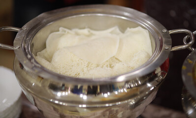 Appam, Palappam,Kallappam,vella appam,parotta,Roti or Chapati a popular traditional Kerala breakfast food.