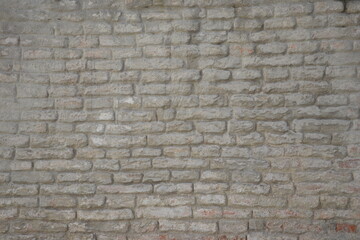 Old brickwork with plaster remnants