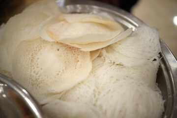 Appam, Palappam,Kallappam,vella appam,parotta,Roti or Chapati a popular traditional Kerala breakfast food.