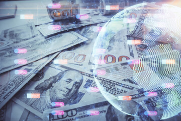 Double exposure of world map drawing over us dollars bill background. International concept.
