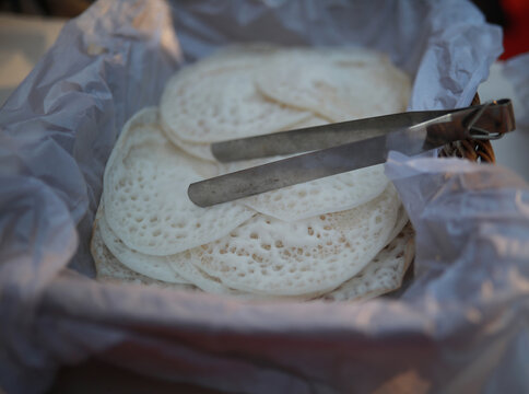 Appam, Palappam,Kallappam,vella appam,parotta,Roti or Chapati a popular traditional Kerala breakfast food.