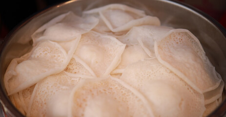 Appam, Palappam,Kallappam,vella appam,parotta,Roti or Chapati a popular traditional Kerala breakfast food.
