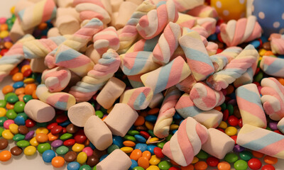 Different sweets decorating a beautiful party table.