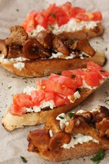 Bruschetta with red tomatoes and chanterelles macro