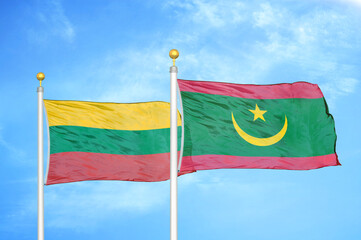 Lithuania and Mauritania two flags on flagpoles and blue sky