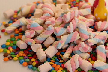 Different sweets decorating a beautiful party table.