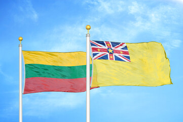 Lithuania and Niue two flags on flagpoles and blue sky