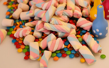 Different sweets decorating a beautiful party table.