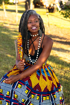 Moody portrait of black woman with pretty African centric dress